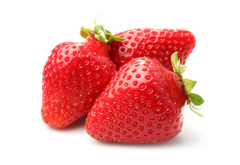 Three fresh ripe strawberries isolated on white