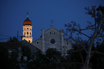 Betina, Croatia, July 19, 2025: Historical cathedral at dusk