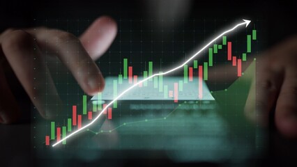 A focused representation of hands interacting with financial data on a digital screen, showcasing stock market trends and growth projections with candlestick graphs and indicators. Copula