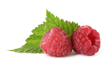 Fresh ripe raspberries and green leaves isolated on white
