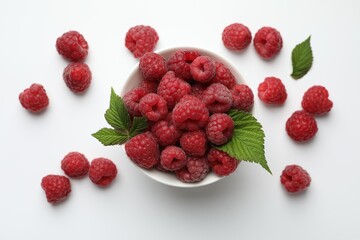 Tasty fresh ripe raspberries and leaves on white background, flat lay