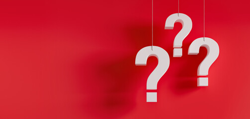 Obraz na płótnie Canvas Three hanging white question marks in front of a red wall with copy space - 3D illustration
