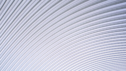 Curve aluminium corrugated steel pattern of large dome roof background in minimal style, low angle and diagonal view with copy space