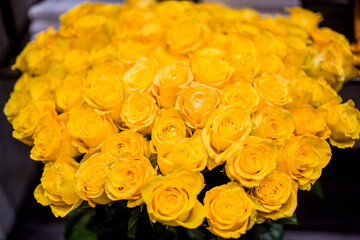 Bouquet of yellow roses creating a stunning floral display for wedding