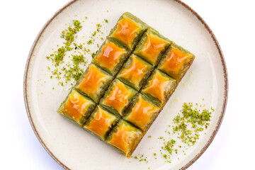 Turkish dessert pistachio baklava on white background. Special mini baklava