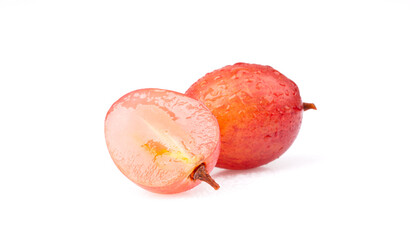 Sweet ripe pink grapes on white background