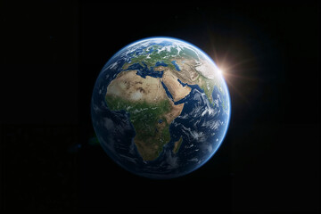 Fototapeta premium Earth planet globe shining in dark space with sunrise light
