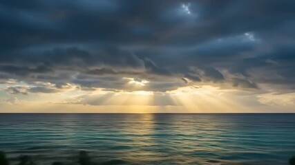 Serene sunset over the ocean with rays of light breaking through clouds, reflecting on water - Powered by Adobe