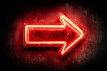 Bright neon arrow sign points right against a textured dark background in a dimly lit space