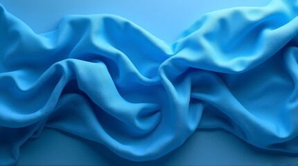 Obraz premium Flowing twisted blue cloth background 