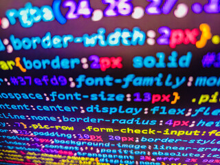 Programmer workplace. Technology background. Digital technology background. Dig. Real Java Script code developing screen. Programmer working in computer screen. Software developer web program script