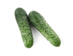 Two fresh green cucumbers isolated on white, top view