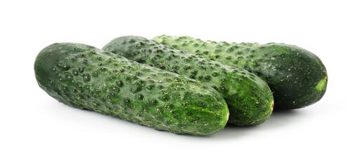 Three fresh green cucumbers isolated on white