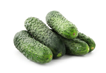 Many fresh green cucumbers isolated on white