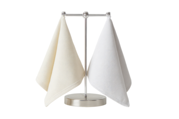 Two folded, light-colored cloths displayed on a metal stand