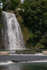 Naklejka premium The Cascata Grande is formed by the left arm of the Liri River and is approximately 27 meters high:one of the few waterfalls to be found in the historic center of a city, unique in Italy and in Europe