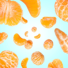 Fototapeta premium Sweet tangerines whirling in air against light blue gradient background