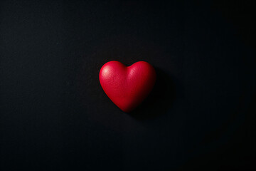 Single Red Heart Shape Object on Dark Textured Background love symbol