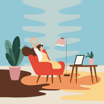 Young Woman Relaxed at Home Office with Tablet in Sitting on a Cozy Interior
