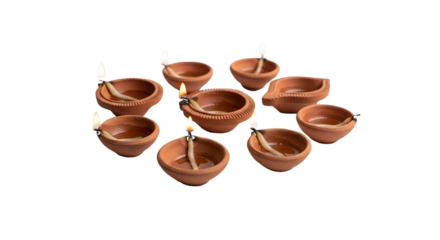 Terracotta diyas with burning flames arranged in a cluster isolated on a transparent background clay Jpg clipping path, social media, Advertisement, HD photo, close up, high quality, web, banner.