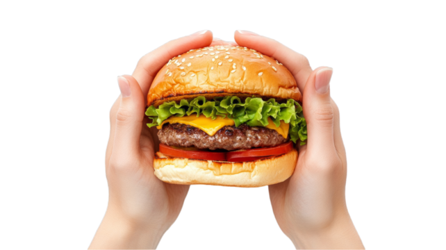 Hands holding a classic hamburger with sesame seed bun, lettuce, cheese, tomato, and beef patty on transparent background