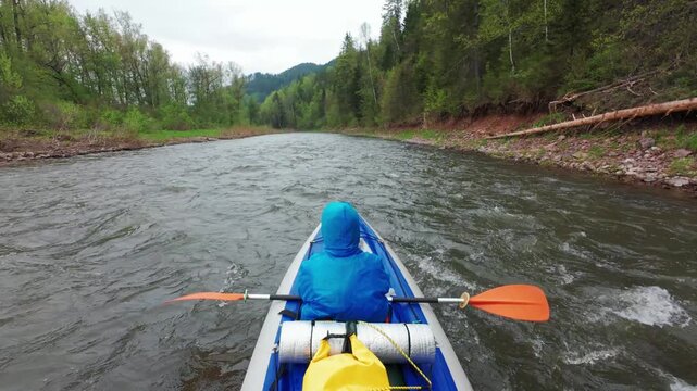 Experience a tranquil kayaking trip on a peaceful river, surrounded by vibrant trees and soothing currentsan ideal outing for nature lovers and outdoor enthusiasts seeking adventure