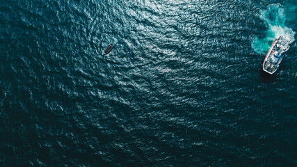 Aerial View of Two Vessels on Deep Blue Ocean Waters