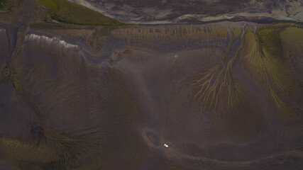 Aerial View of Volcanic Terrain and River Patterns in Iceland