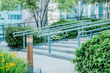 Obraz premium Outdoor Staircase with Handrails and Greenery