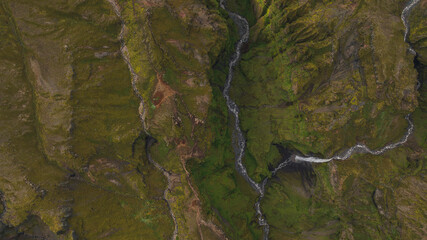 Aerial View of Icelandic Canyon with River and Waterfall