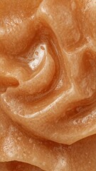 Fototapeta premium Glossy Warm Amber Gel Swirl Background with Viscous Texture and Bubbles