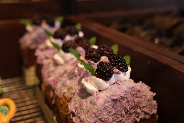 This exquisite dessert showcases modern confectionery art with its smooth purple mousse layers,...