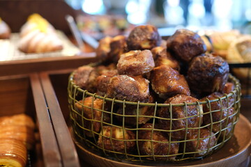 chocolate cinnamon donuts Basket meatballs display. High quality photo