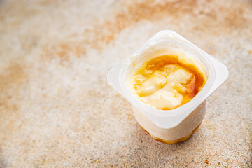 Rice pudding caramel syrup sweet dessert snack fresh delicious gourmet food background on the table rustic food top view copy space