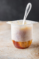 Rice pudding caramel syrup sweet dessert snack fresh delicious gourmet food background on the table rustic food top view copy space