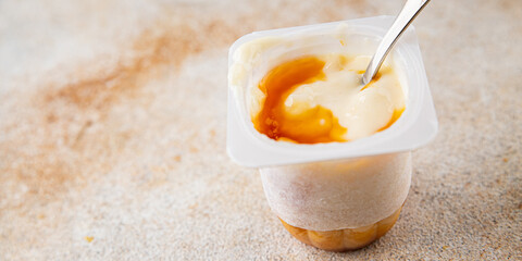 Rice pudding caramel syrup sweet dessert snack fresh delicious gourmet food background on the table rustic food top view copy space