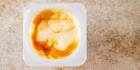 Rice pudding caramel syrup sweet dessert snack fresh delicious gourmet food background on the table rustic food top view copy space