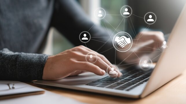 Forging Digital Partnerships – Startup Professional Working on Laptop with Floating Handshake Icon, Representing Online Networking, Business Collaboration, and Trust Building

 - Powered by Adobe