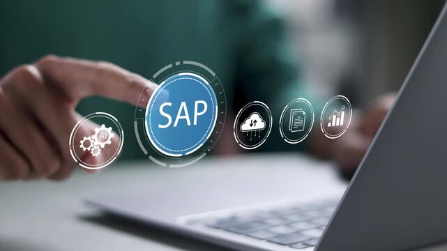 SAP or ERP enterprise resources planning system concept, Person using laptop with SAP icons for business process automation software and management software (SAP) - Powered by Adobe