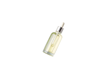Clear glass dropper bottle with yellow liquid isolated on a transparent background image
