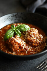 Meatballs in tomato sauce with parmesan and basil