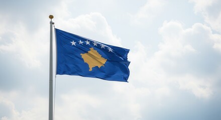 KosovoNational Flag Waving on Tall Flagpole in Sky with Clouds – Kosovo Independence Day Celebration, Patriotism, Freedom, Kosovo Culture & Heritage
