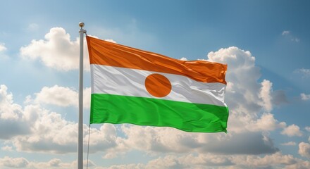 Niger National Flag Waving on Tall Flagpole in Sky with Clouds – Niger Independence Day Celebration, Patriotism, Freedom, Niger Culture & Heritage
