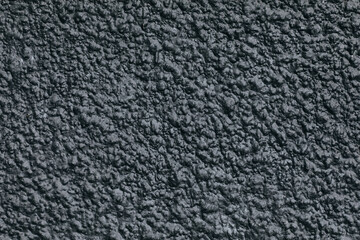 Rough Dark Gray Stucco Wall Texture Close-Up