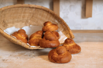 Sicilian Brioche Buns in basket Isolated on wooden Background side view of italian baked food