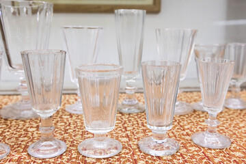 Collection of Clear Vintage Glassware on a Traditional Decorative Surface