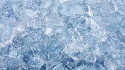 Obraz premium Various jagged ice pieces create a striking visual pattern on a cold surface, showcasing the beauty of winter's chill and the natural formation of ice crystals.