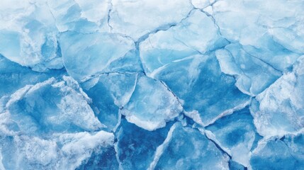 Obraz premium Unique patterns emerge from cracked ice on a frozen lake. The varying shades of blue and white reflect the cold beauty of winter, creating an eye-catching natural wonder.