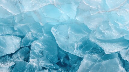 Obraz premium Glacial ice chunks reflect blue and turquoise hues under natural light, creating a mesmerizing visual of frozen textures that highlight the beauty of winter landscapes.