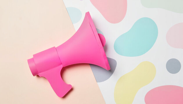 Vibrant pink megaphone on abstract pastel backdrop, artistic expression